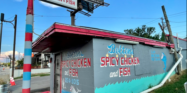 Bolton's is a popular no-frills East Nashville hot chicken joint. A sign above the kitchen warns, "Please wash your hands before rubbing your eyes or your babies!"