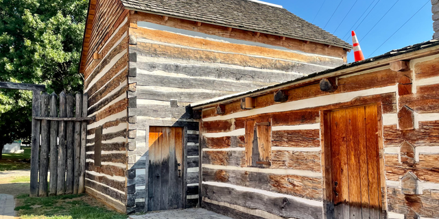 Fort Nashborough is a recreation of a pioneer village on the Cumberland River, at the end the city's raucous Lower Broadway nightlife district.