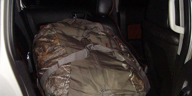 The drugs were found in duffel bags in an abandoned car near the Canadian border. 