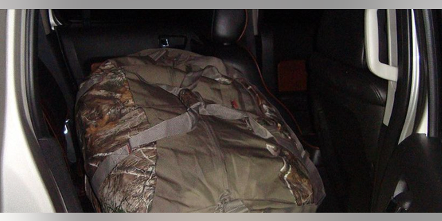 The drugs were found in duffel bags in an abandoned car near the Canadian border. 