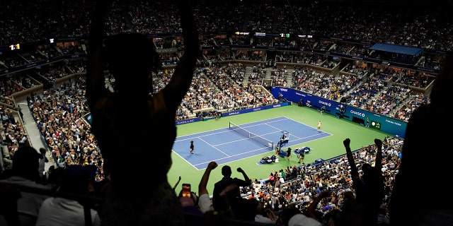 Fans react as Serena Williams of the United States takes on Anett Kontaveit of Estonia during their second round match at the US Open tennis championships on Wednesday, August 31, 2022 in New York.