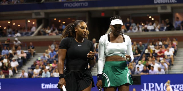 Serena Williams and Venus Williams of The United States confer against Lucie Hradecka and Linda Noskova of Czech Republic during the Women's Doubles First Round match on Day Four of the 2022 US Open at USTA Billie Jean King National Tennis Center on September 01, 2022, in the Flushing neighborhood of the Queens borough of New York City. 