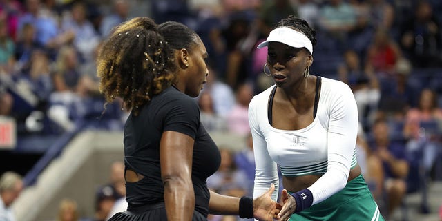 Serena Williams and Venus Williams of The United States react to a point against Lucie Hradecka and Linda Noskova of Czech Republic during the Women's Doubles First Round match on Day Four of the 2022 US Open at USTA Billie Jean King National Tennis Center on September 01, 2022, in the Flushing neighborhood of the Queens borough of New York City. 
