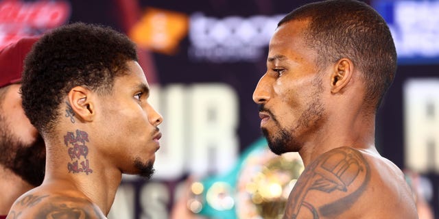 Shakur Stevenson, left, and Robson Conceição face off during the weigh-in ahead of their WBC and WBO junior lightweight championship fight at Prudential Center Sept. 22, 2022, in Newark, N.J.