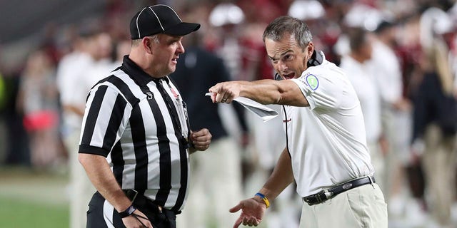 South Carolina coach Shane Beamer questions a penalty call during the second half of the team's NCAA college football game against Charlotte on Saturday, Sept. 24, 2022, in Columbia, S.C.