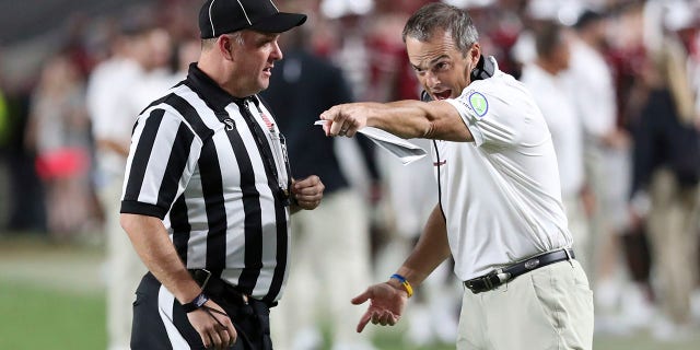 South Carolina coach Shane Beamer questions a penalty call during the second half of the team's NCAA college football game against Charlotte on Saturday, Sept. 24, 2022, in Columbia, S.C.