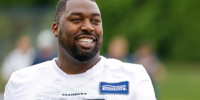 Seattle Seahawks defensive end Shelby Harris, #93, walks back to the locker room following minicamp practice at the Virginia Mason Athletic Center June 7, 2022, in Renton, Washington.