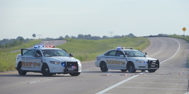 Harris County Sheriff's vehicles block the Crosby Freeway in Crosby, Texas, Aug. 31, 2017. 