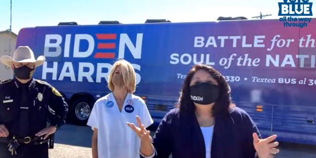 Bexar County Sheriff Javier Salazar stand in front of a Biden-Harris campaign bus alongside failed Democratic House candidate Wendy Davis (C) and Monica Alcántara (R) in a Facebook livestream video posted by Salazar on Oct. 20, 2020.