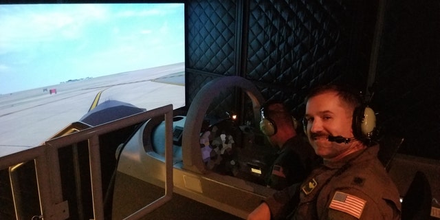 Andy Grieb, a T-6 instructor pilot, is a plaintiff in the First Liberty case who was grounded and ordered by the Air Force to teach in a simulator (pictured here) because his request for religious accommodation was denied .  (First Freedom Institute)
