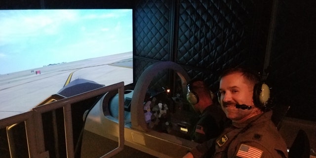 Andy Grieb, a T-6 instructor pilot, is one plaintiff in First Liberty's case who has been grounded from flying and ordered to instruct in a simulator (pictured here) by the Air Force because his religious accommodation request was denied. (First Liberty Institute)