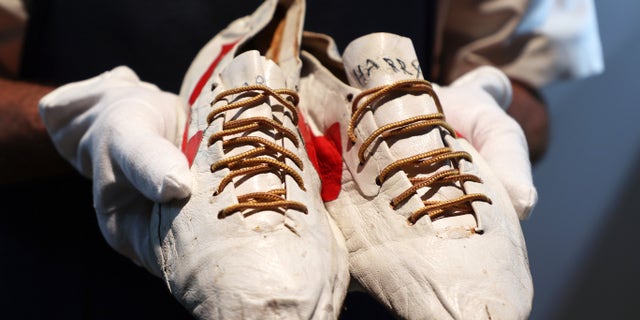 Bill Bowerman (Nike co-founder) handmade prototype logo track spikes with waffle sole were on display during a press preview of The Olympic Collection at Sotheby's on July 21, 2021, in New York City.