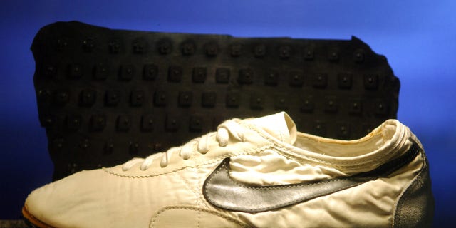 The Nike "Moon Shoe" worn by Mark Covert in the 1972 U.S. Olympic Trials at Niketown Eugene in Eugene, Ore. The waffle-soled shoes were made by Bill Bowerman with a waffle iron and were the first Nike shoes worn during competition.