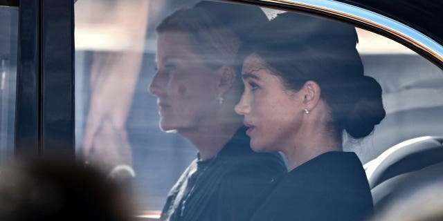 Meghan Markle and Sophie, Countess of Wessex, sit together on their way to Westminster Hall for Queen Elizabeth's funeral.