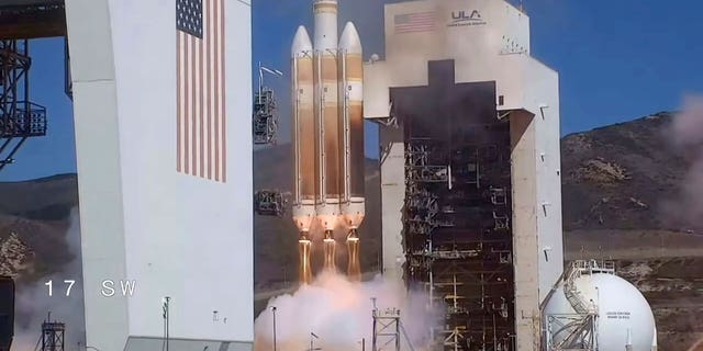Shuttle launching into orbit