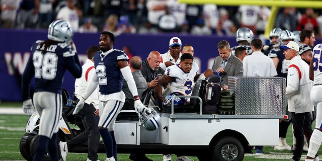 Sterling Shepard (3) of the New York Giants is carted off the field after getting injured against the Dallas Cowboys during the fourth quarter of the game at MetLife Stadium on September 26, 2022 in East Rutherford, NJ