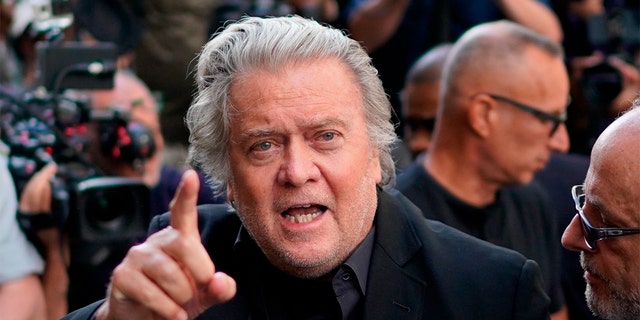 Former White House strategist Steve Bannon arrives at the Manhattan district attorney's office to surrender himself to New York authorities, Thursday, Sept. 8, 2022, in New York.