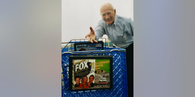 I'm a "Fox & Friends" Presenter, But I'll Never Forget the Hilarious Thing My Late Dad Did at the Grocery Store 4 Jim Doocy, Steve Doocy's father with a grocery cart displaying an advertisement for "Fox and friends."