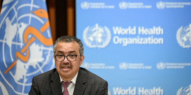 World Health Organization (WHO) Director-General Tedros Adhanom Ghebreyesus attends a ceremony to launch a multiyear partnership with Qatar on making FIFA Football World Cup 2022 and mega sporting events healthy and safe at the WHO headquarters in Geneva on October 18, 2021. 