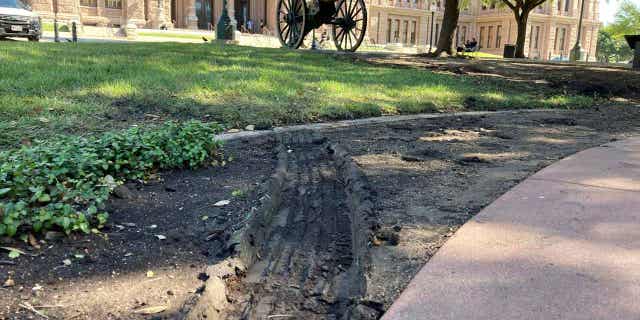 Suspect arrested for recklessly driving through TX State Capitol grounds in Austin, leaving a trail of damage