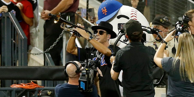 Musician Timmy Trumpet performs his song 'Narco' as Edwin Diaz  of the New York Mets takes the mound during the ninth inning against the Los Angeles Dodgers at Citi Field on August 31, 2022 in New York City.