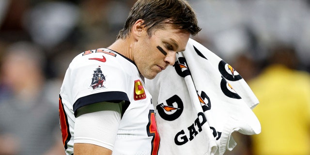 #12 Tom Brady of the Tampa Bay Buccaneers warms up before facing the New Orleans Saints at the Caesars Superdome in New Orleans on Sept. 18, 2022.