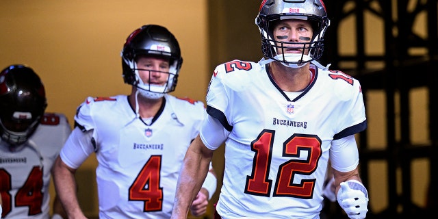 Tampa Bay Buccaneers quarterback Tom Brady runs onto the field before the game against the Indianapolis Colts.