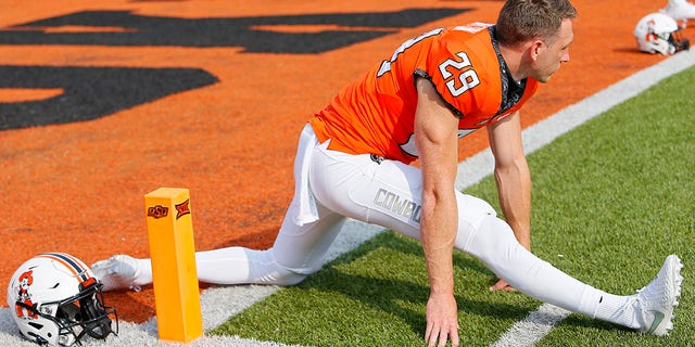 Oklahoma State Cowboys punter Tom Hutton stretches before a game against the Tulsa Golden Hurricanes on Sept. 19, 2020 at Boone Pickens Stadium in Stillwater, Oklahoma.