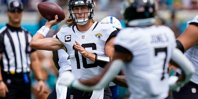 Jacksonville Jaguars quarterback Trevor Lawrence (16) throws against the Indianapolis Colts during the first half of an NFL football game, Sunday, Sept. 18, 2022, in Jacksonville, Fla.