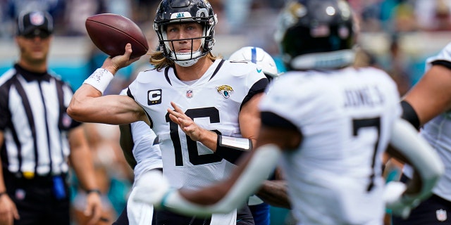 Jacksonville Jaguars quarterback Trevor Lawrence (16) throws against the Indianapolis Colts during the first half of an NFL football game, Sunday, Sept. 18, 2022, in Jacksonville, Fla.