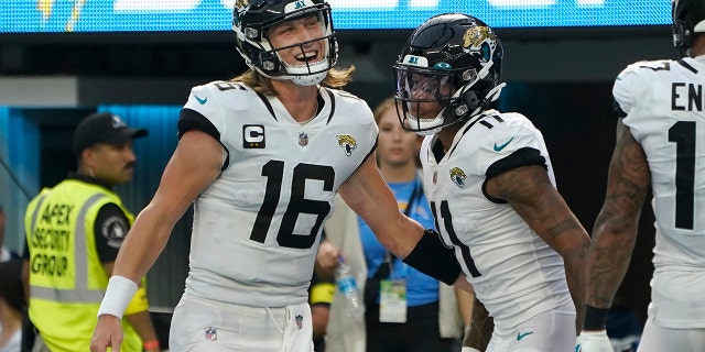 Trevor Lawrence thrives in Chargers rout of Jaguars 2 Jacksonville Jaguars quarterback Trevor Lawrence (16) and wide receiver Marvin Jones Jr. celebrate after connecting on a touchdown pass in the second half of an NFL football game against the Chargers from Los Angeles to Inglewood, Calif. on Sunday, September 25, 2022.