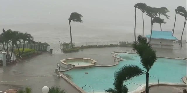 Video captured by WFTX reporter Elyse Chengery showed a pool at a hotel on Sanibel Island, Florida, Wednesday, before Hurricane Ian flooded it.