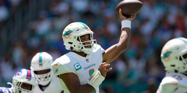 Miami Dolphins quarterback Tua Tagovailoa (1) aims a pass during the first half of an NFL football game against the Buffalo Bills, Sunday, Sept. 25, 2022, in Miami Gardens.