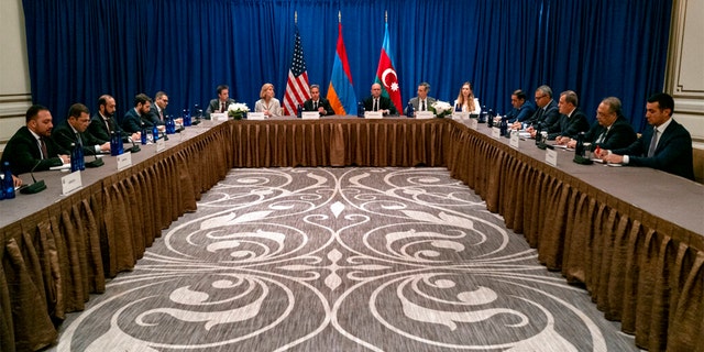 Secretary of State Antony Blinken, center, meets an Armenian delegation that includes Foreign Minister Ararat Mirzoyan, third from left, and a delegation with Azerbaijan, including Azerbaijani Foreign Minister Jeyhun Bayramov, third from right, on Monday 19 September 2022 in New York.