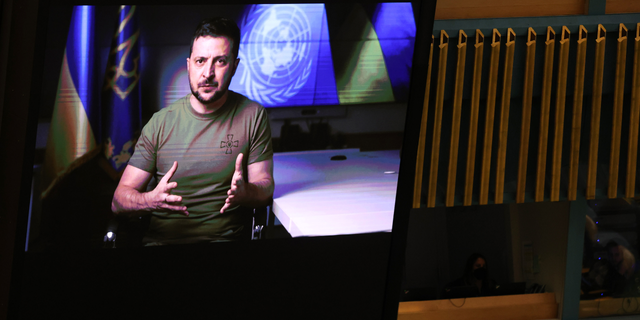 Ukrainian President Volodymyr Zelensky speaks to world leaders via a video link as they attend the 77th United Nations (UN) General Assembly which returned in person this week for the first time in three years on September 21, 2022 in New York City.  Over the course of the week, leaders and diplomats will discuss the global food crisis, rising inflation and the ongoing conflict in Ukraine, among other pressing global issues. 