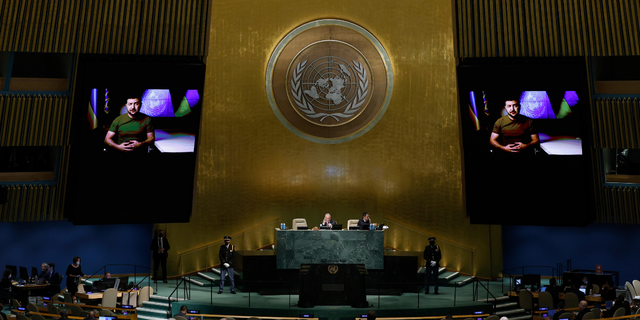 Delegates hear a pre-recorded speech by Ukrainian President Volodymyr Zelensky during the 77th session of the United Nations General Assembly (UNGA) at the United Nations Headquarters on September 21, 2022 in New York City.  After two years of holding the virtual or hybrid session, 157 heads of state and government representatives are expected to attend the General Assembly in person.