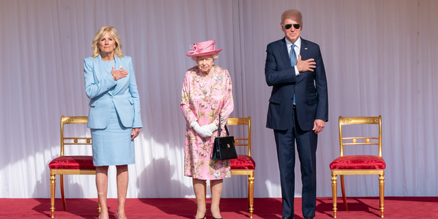 Queen Elizabeth II stands with US President Joe Biden and First Lady Jill Biden during their visit to Windsor Castle on June 13, 2021, in Windsor, England.  Queen Elizabeth II hosts US President, Joe Biden and First Lady Dr Jill Biden at Windsor Castle.