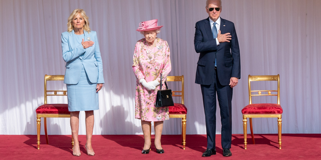 Queen Elizabeth II stands with US President Joe Biden and First Lady Jill Biden during their visit to Windsor Castle on June 13, 2021, in Windsor, England. Queen Elizabeth II hosts US President, Joe Biden and First Lady Dr Jill Biden at Windsor Castle.