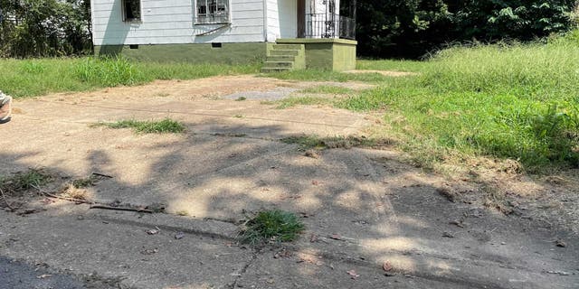 Tire tracks approaching the house where the body of the house where the body of Eliza Fletcher was found