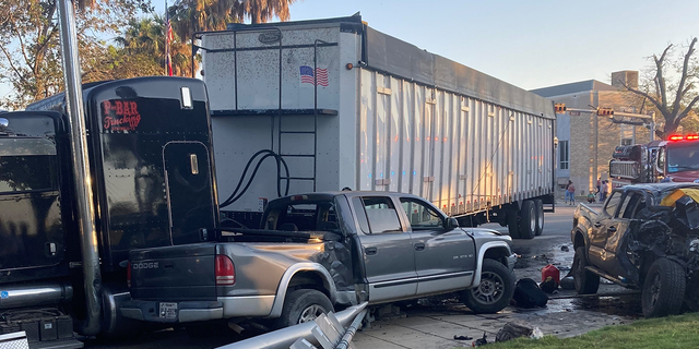 The semi truck that was crashed into by a driver smuggling 9 illegal migrants in Uvalde, Texas.