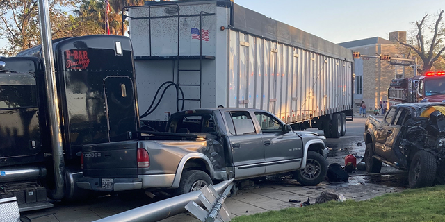 The semi truck that was crashed into by a driver smuggling 9 illegal migrants in Uvalde, Texas.