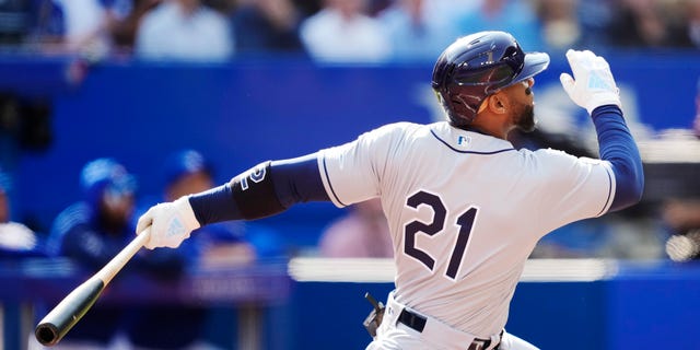Yandy Diaz of the Tampa Bay Rays hits a home run against the Toronto Blue Jays in the second inning during a game at the Rogers Centre Sept. 15, 2022, in Toronto, Ontario, Canada. 