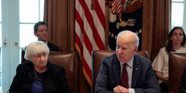 Treasury Secretary Janet Yellen listens as President Biden speaks on March 3, 2022, at the White House.