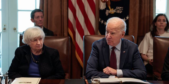 Treasury Secretary Janet Yellen listens as President Biden speaks on March 3, 2022, at the White House.