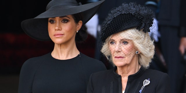 Meghan, Duchess of Sussex and Camilla, Queen Consort during the State Funeral of Queen Elizabeth II at Westminster Abbey on September 19, 2022, in London, England.