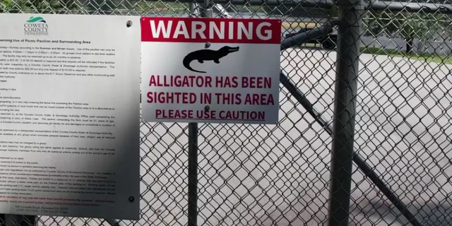 Investigators said the victim's boyfriend did a quick Google search to find an online image of an alligator warning sign for boaters at the reservoir.