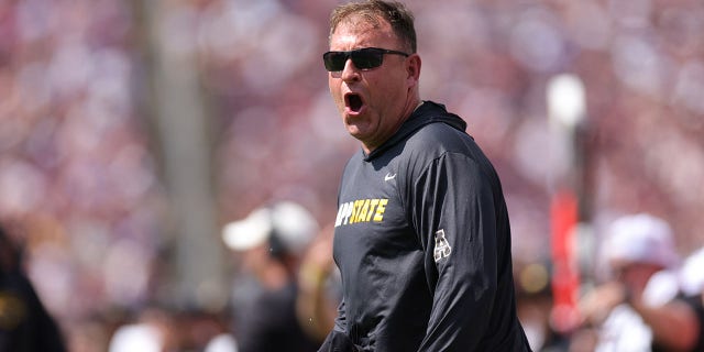 Â Head coach Shawn Clark of the Appalachian State Mountaineers reacts to a pass interference call during the first half against the Texas A&M Aggies at Kyle Field on September 10, 2022 in College Station, Texas.Â