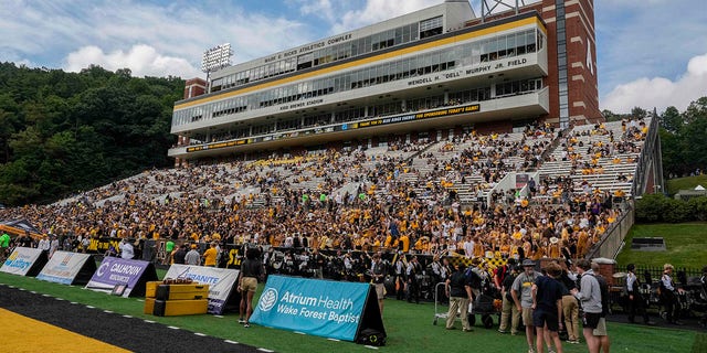  Appalachian State Mountaineers fans in the stadium before the game against the North Carolina Tar Heels at Kidd Brewer Stadium.