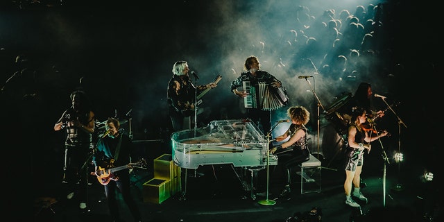 Richard Reed Parry, Win Butler, Tim Kingsbury, Régine Chassagne and Sarah Neufeld of Arcade Fire perform at The 3Arena Dublin on August 30, 2022 in Dublin, Ireland. 