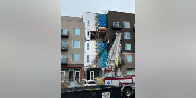 Firefighters were investigating smoke coming out of the building when the explosion took place.